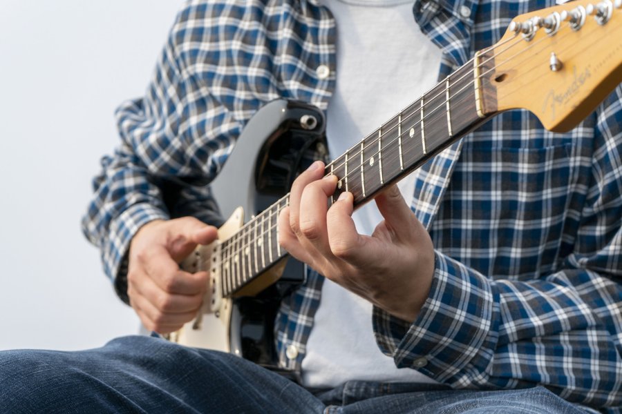 Sam Borrello playing guitar